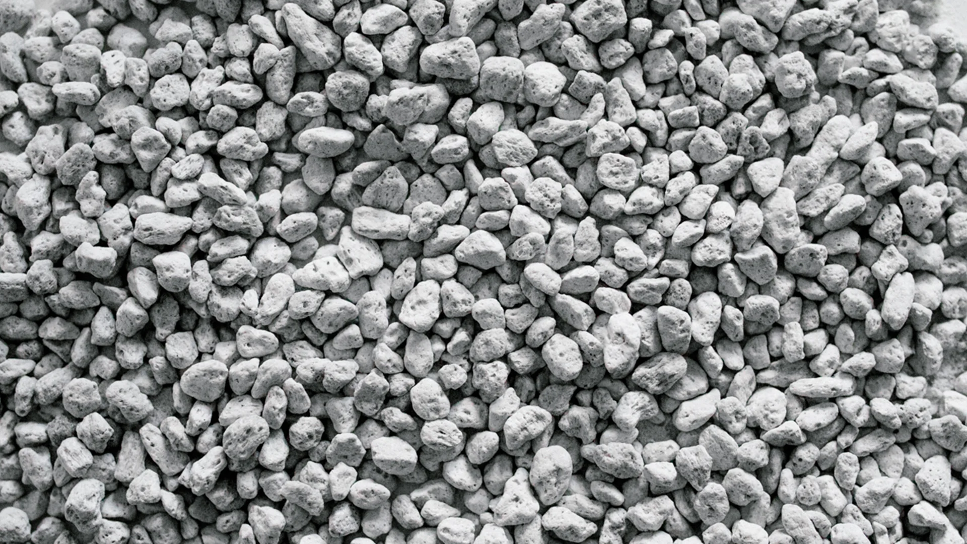 Sifted horticultural pumice in a tray, light grey volcanic glass granules at 1-6mm grade